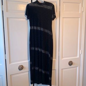 Ladies Black velvet gown with silver sparkles. Dress is 19 inches wide.